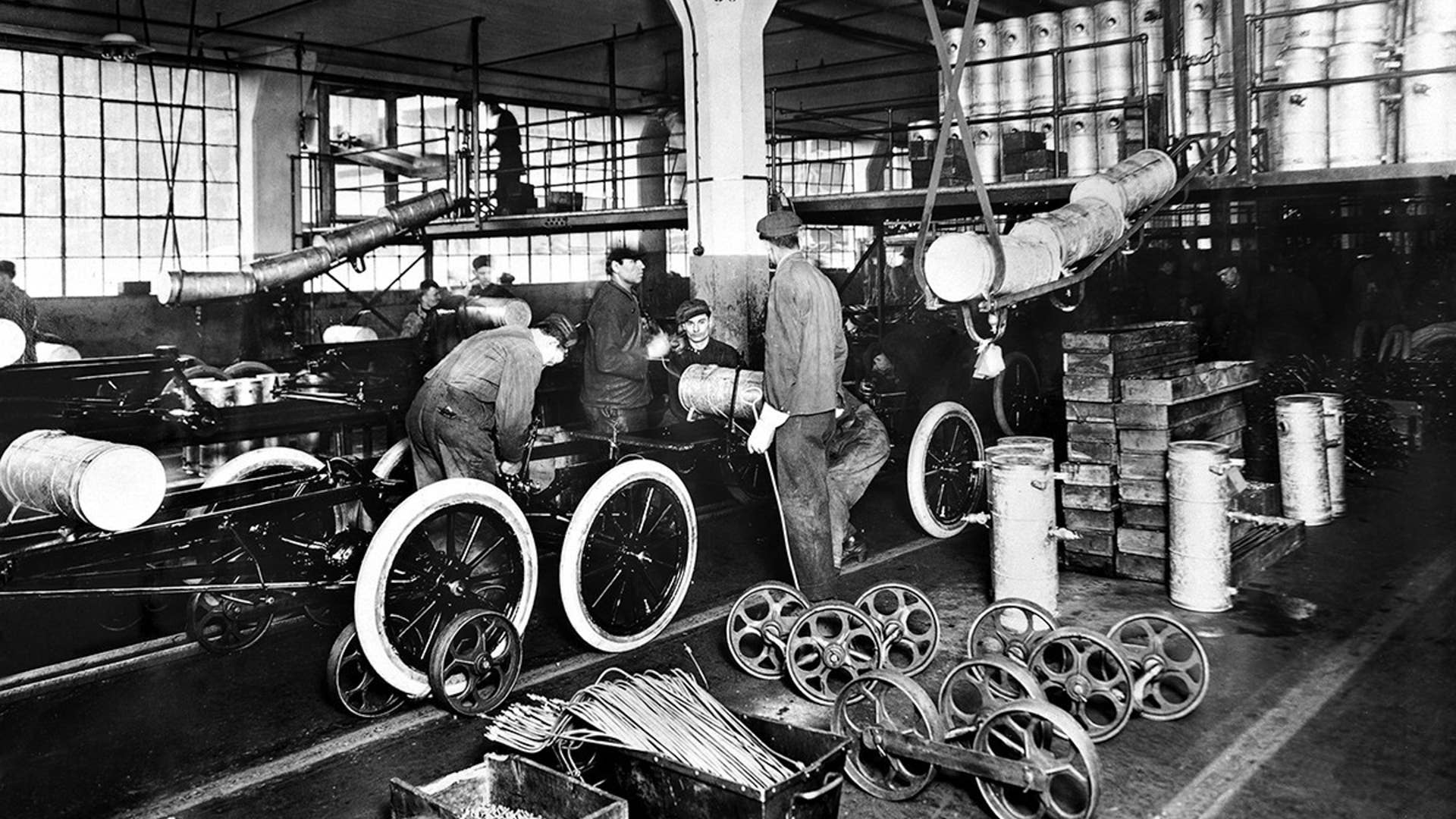1913: At the Highland Park Plant in 1913, Henry Ford introduced the first moving assembly line for cars. Within 18 months it took only 1.5 man-hours to build a Model T. The modern auto industry was born.