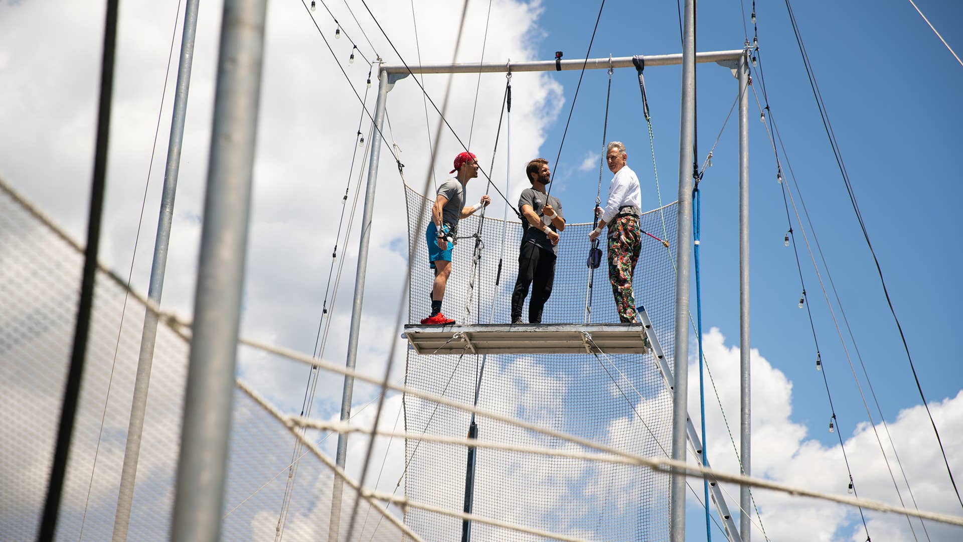 Santa Barbara, CA - Jeff Goldblum (R) prepares to try the trapeze. (Credit: National Geographic)