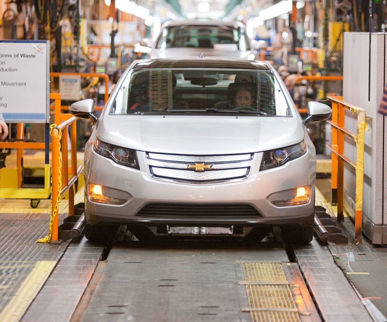 The first pre-production Chevrolet Volt rolls off the line at the Detroit-Hamtramck manufacturing plant Wednesday, March 31, 2010 in Detroit, Michigan. The pre-production versions of the Volt will not be sold at dealerships, but will be used to assure all steps in the production system will meet the quality targets set by the Volt engineering team. (Photo by John F. Martin for Chevrolet) (04/01/2010)