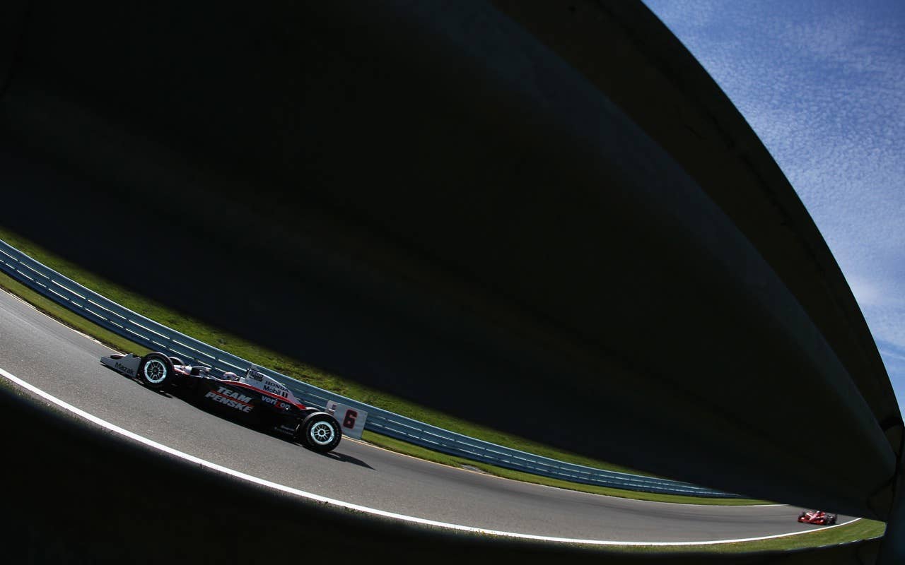 during the IZOD IndyCar Series Camping World Grand Prix at the Glen at Watkins Glen International on July 4, 2010 in Watkins Glen, New York.