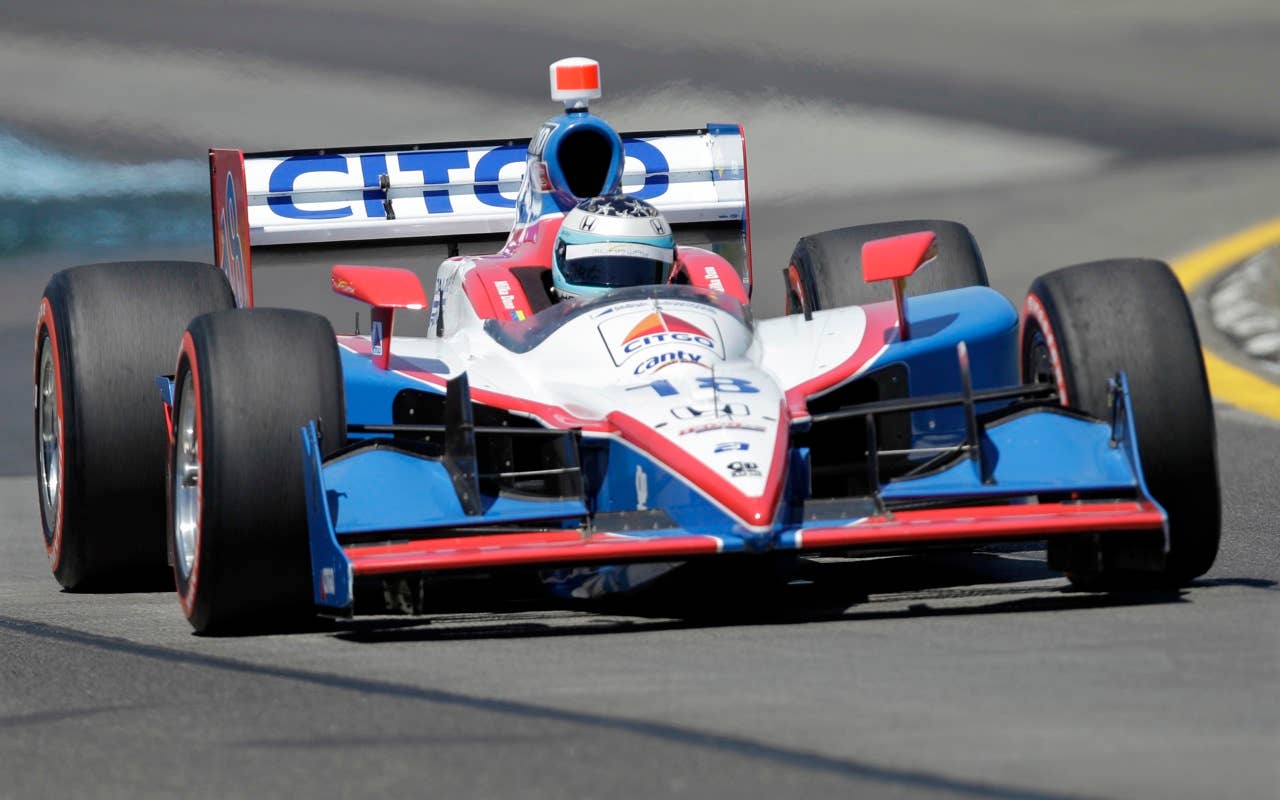 Milka Duno of Venezuela drives her race car during qualifying Saturday, July 3, 2010, for the IndyCar Series' Watkins Glen Camping World Grand Prix at The Glen in Watkins Glen, N.Y. (AP Photo/Mel Evans)