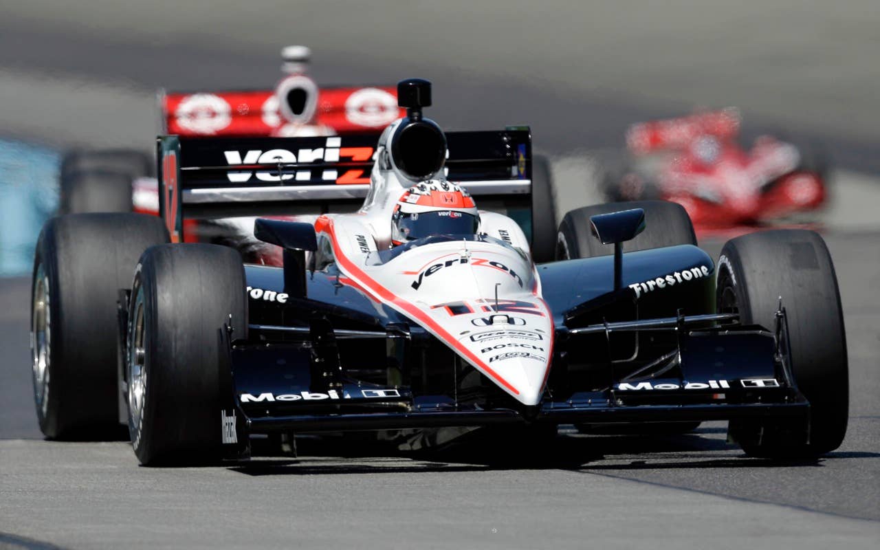 Will Power of Australia leads some other drivers during qualifying Saturday, July 3, 2010, for the IndyCar Series' Watkins Glen Camping World Grand Prix at The Glen in Watkins Glen, N.Y. Power won the pole position for Sunday's race. (AP Photo/Mel Evans)