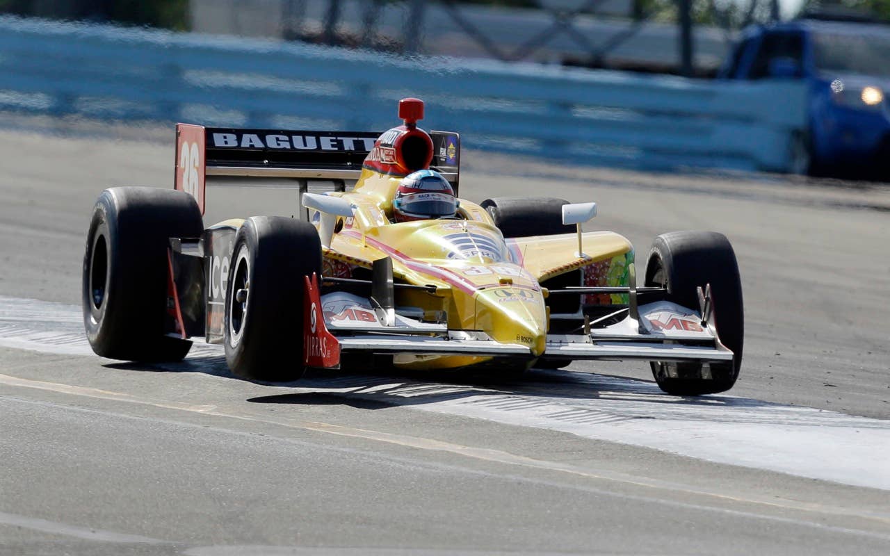 Bertrand Baguette of Belgium hits rumble strips in turn one Sunday, July 4, 2010, during the IndyCar Series' Watkins Glen Camping World Grand Prix at The Glen in Watkins Glen, N.Y. (AP Photo/Mel Evans)