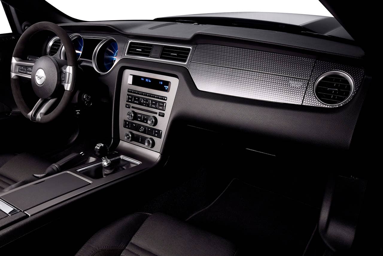 2012 Ford Mustang Boss 302: 2012 Mustang Boss 302 interior showing standard Alcantara-covered steering wheel and IP treatment. (08/13/2010)