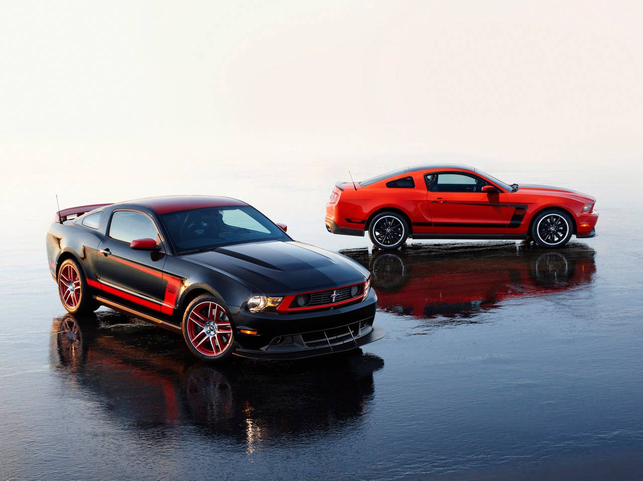 2012 Mustang Boss 302 Laguna Seca: The race-ready 2012 Mustang Boss 302 Laguna Seca (foreground) and the street-legal Mustang Boss 302 (background). (08/13/2010)
