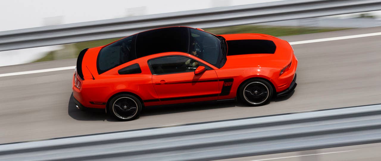 2012 Ford Mustang Boss 302: The high-performance 2012 Mustang Boss 302 features a unique exterior treatment, race-inspired wheels and aerodynamics and a high-revving 440-hp version of the company's all-new 5.0-liter V8. (08/13/2010)