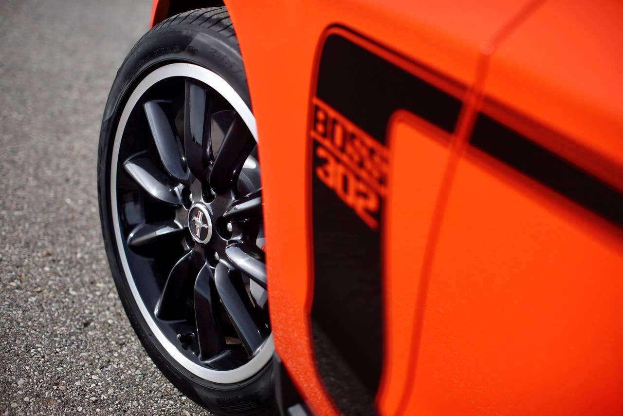 2012 Ford Mustang Boss 302: The high-performance 2012 Mustang Boss 302 features a unique exterior treatment, race-inspired wheels and aerodynamics and a high-revving 440-hp version of the company's all-new 5.0-liter V8. (08/13/2010)