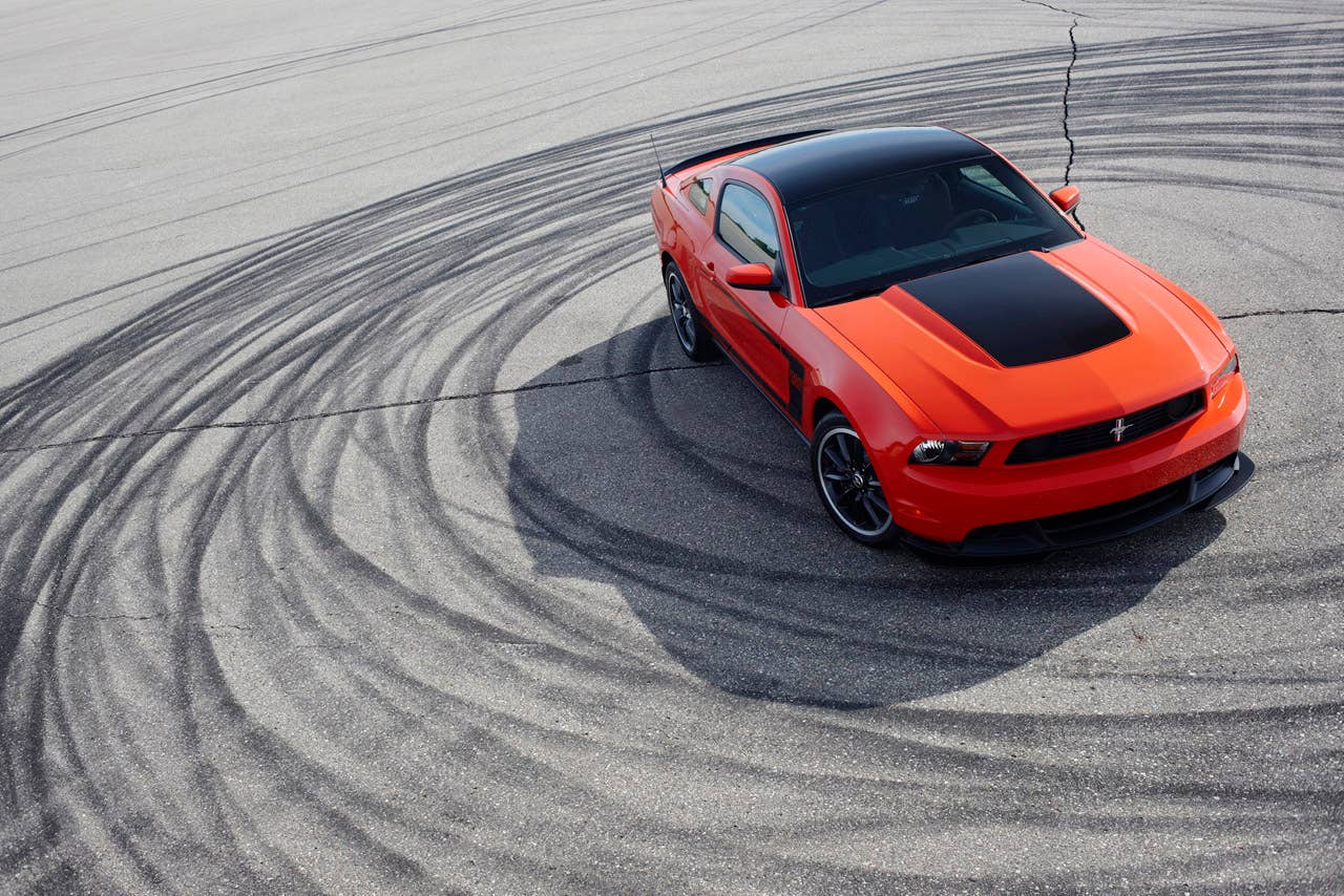 2012 Ford Mustang Boss 302: The high-performance 2012 Mustang Boss 302 features a unique exterior treatment, race-inspired wheels and aerodynamics and a high-revving 440-hp version of the company's all-new 5.0-liter V8.