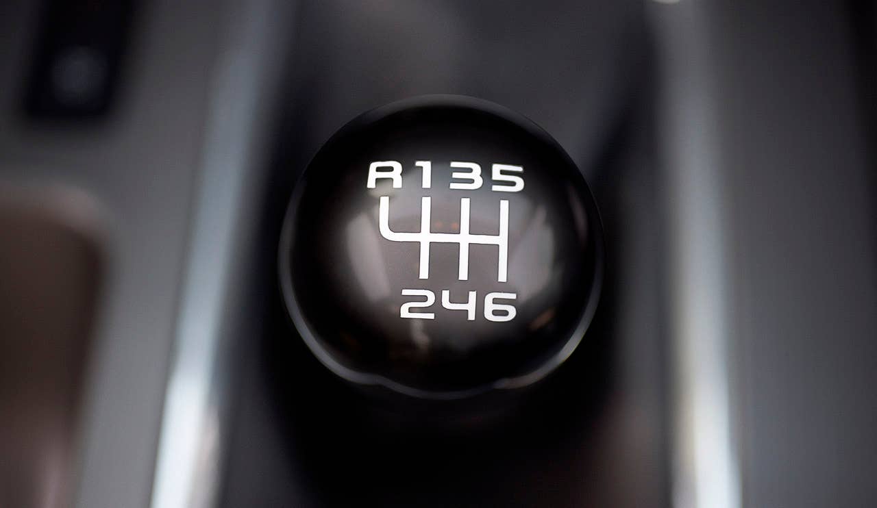 2012 Ford Mustang Boss 302: A short-throw six-speed manual transmission with cue-ball shifter knob is standard equipment on Boss 302 and Laguna Seca cars. (08/13/2010)
