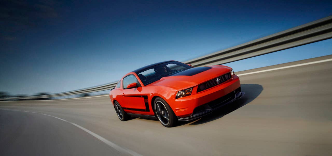 2012 Ford Mustang Boss 302: The high-performance 2012 Mustang Boss 302 features a unique exterior treatment, race-inspired wheels and aerodynamics and a high-revving 440-hp version of the company's all-new 5.0-liter V8. (08/13/2010)