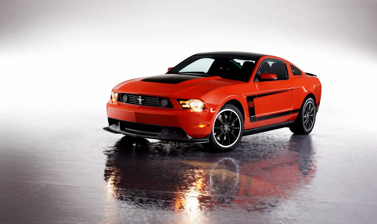 2012 Ford Mustang Boss 302: The high-performance 2012 Mustang Boss 302 features a unique exterior treatment, race-inspired wheels and aerodynamics and a high-revving 440-hp version of the company's all-new 5.0-liter V8.