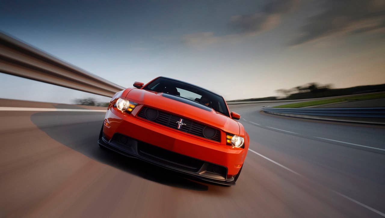 2012 Ford Mustang Boss 302: The high-performance 2012 Mustang Boss 302 features a unique exterior treatment, race-inspired wheels and aerodynamics and a high-revving 440-hp version of the company's all-new 5.0-liter V8. (08/13/2010)