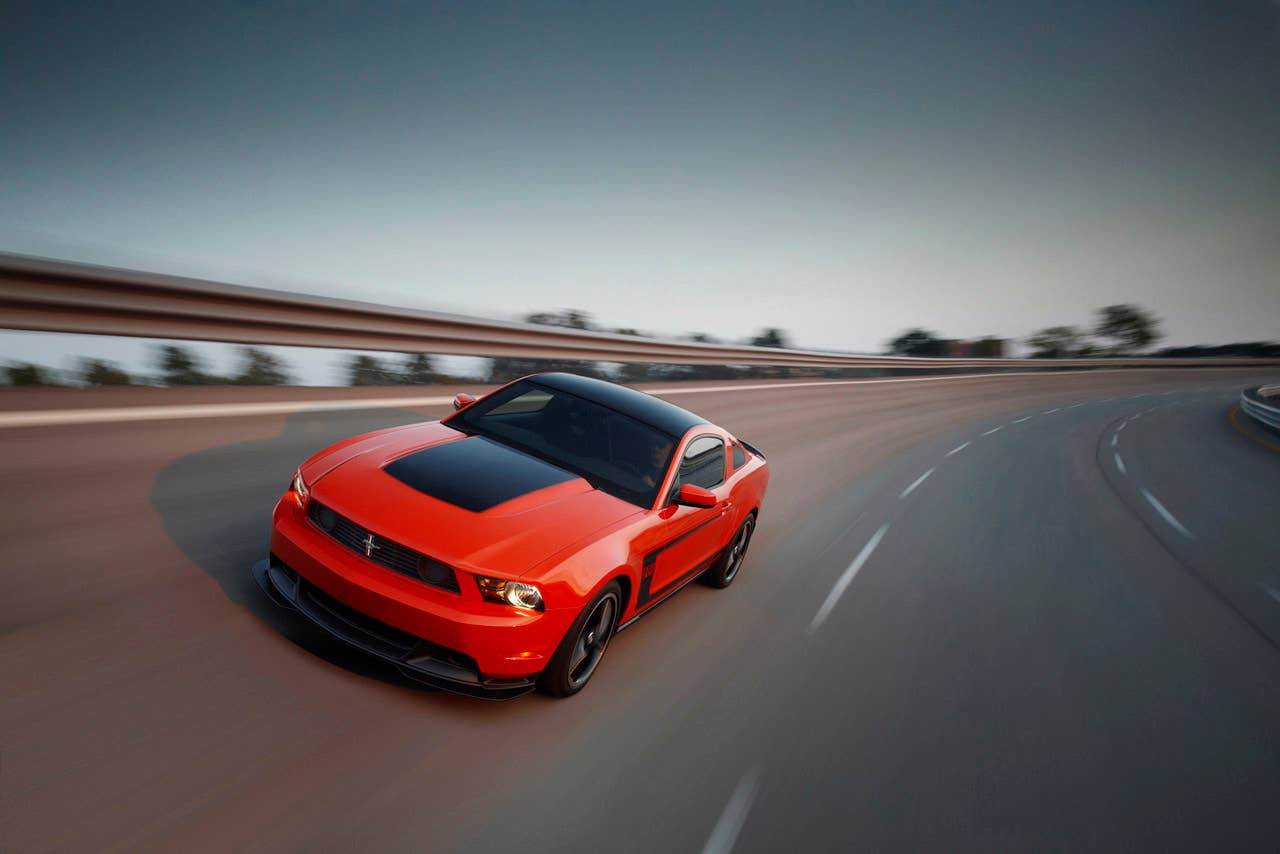 2012 Ford Mustang Boss 302: The high-performance 2012 Mustang Boss 302 features a unique exterior treatment, race-inspired wheels and aerodynamics and a high-revving 440-hp version of the company's all-new 5.0-liter V8. (08/13/2010)