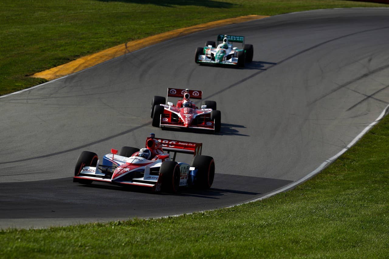 LEXINGTON, OH - AUGUST 08:  Vitor Meira of Brazil, driver of the #14 ABC Supply Co. A.J. Foyt Racing Dallara Honda drives during the IZOD IndyCar Series Honda Indy 200 on August 8, 2010 in Lexington, Ohio.  (Photo by Chris Graythen/Getty Images)