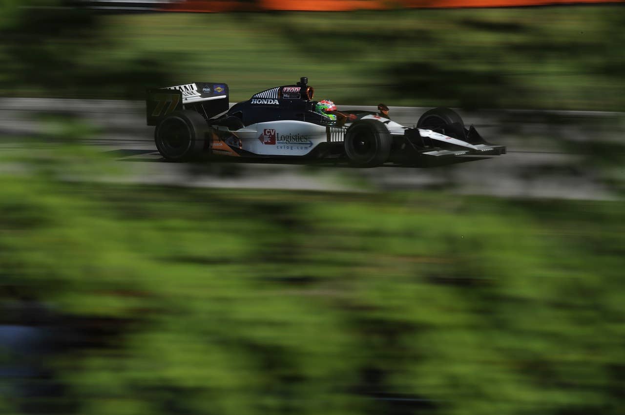 LEXINGTON, OH - AUGUST 07:  Alex Tagliani of Canada drives the # 77 FAZZT Race Team Dallara Honda during practice for the IZOD Indycar Series Honda Indy 200 at the Mid-Ohio Sports Car Course on August 7, 2010 in Lexington, Ohio.  (Photo by Rick Dole/Getty Images)
