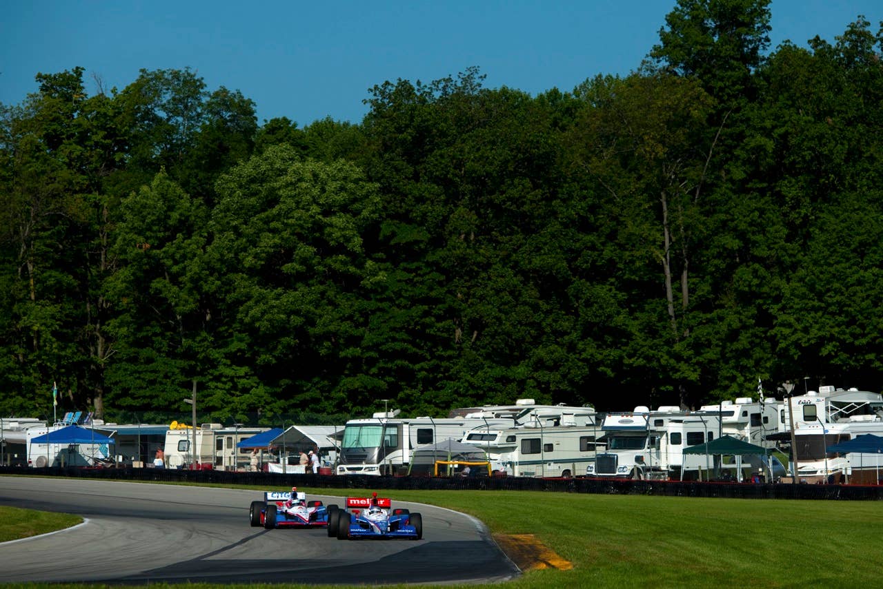 LEXINGTON, OH - AUGUST 07:  Marco Andretti drives the #26 Andretti Autosport Dallara Honda ahead of Milka Duno of Venezuela during practice for the IZOD IndyCar Series Honda Indy 200 on August 7, 2010 in Lexington, Ohio.  (Photo by Robert Laberge/Getty Images)