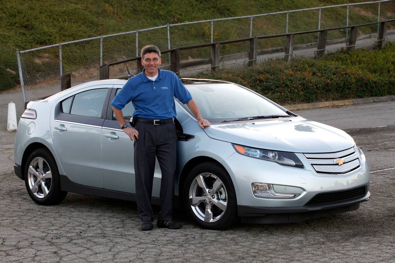 11/29/09 7:17:39 -- Los Angeles, CA, U.S.A Vehicle Chief Engineer Andrew Farah and the new Chevy Volt during the Dodger Stadium ride and drive.