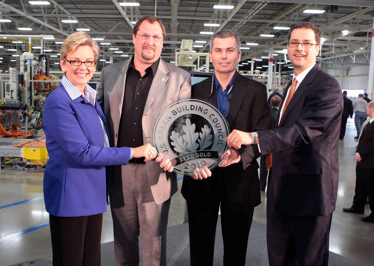 Trenton  March 19, 2010  Chrysler Group Head of Manufacturing Scott Garberding, right, Don DeKeyser, Head of Trenton South Engine Plant, second from right, Michigan Governor Jennifer Granholm, left, and Tim Bressler, UAW Chrysler Department Assistant Director, celebrate the LEED Gold Certification awarded to the all-new Trenton South Engine Plant for demonstrating Chrysler's dedication to the environment and surrounding communities.  The plant will produce the all-new Pentastar V-6 engine which improves flexibility and fuel efficiency for future Chrysler vehicles. (Joe Wilssens photo) For more information contact Jodi Tinson at 248-512-2944.