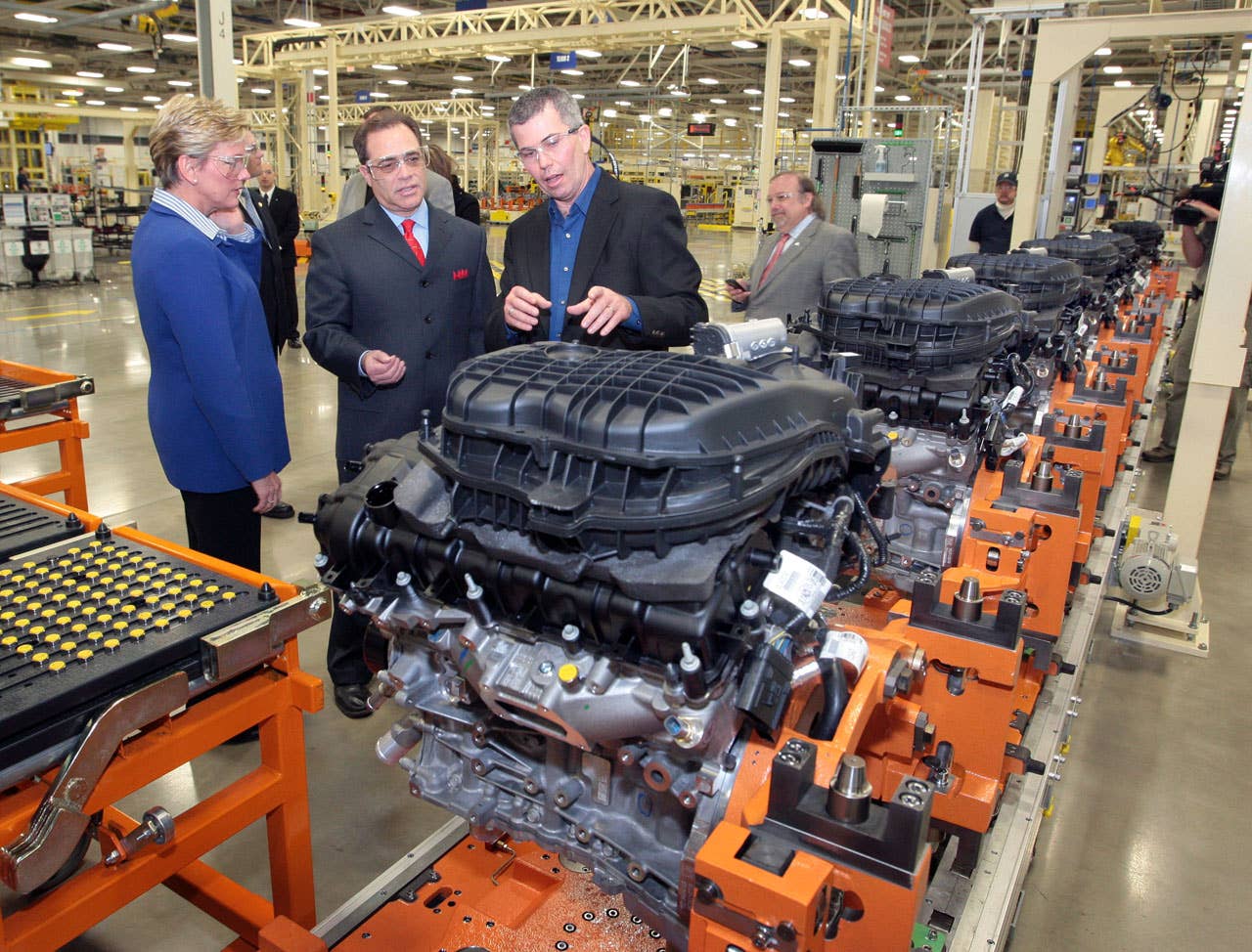 Trenton  March 19, 2010  Don DeKeyser, Head of Trenton South Engine Plant, right, shows Chrysler Group LLC's all-new engine plant to Michigan Governor Jennifer Granholm, left, and Wayne County Executive Robert Ficano during a celebration event at the facility today.  Trenton South Engine Plant is the first engine manufacturing facility to receive LEED Gold certification and demonstrates Chrysler's dedication to the environment and surrounding communities.  The plant will produce the all-new Pentastar V-6 engine which improves flexibility and fuel efficiency for future Chrysler vehicles. (Joe Wilssens photo) For more information contact Jodi Tinson at 248-512-2944.