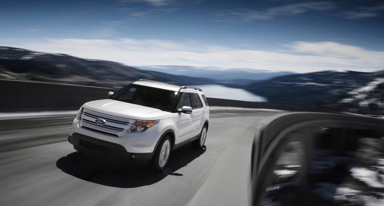 2011 Ford Explorer: The all-new Explorer features tight, muscular lines with sculpted body side surfaces providing family resemblance to Taurus. (07/26/2010)