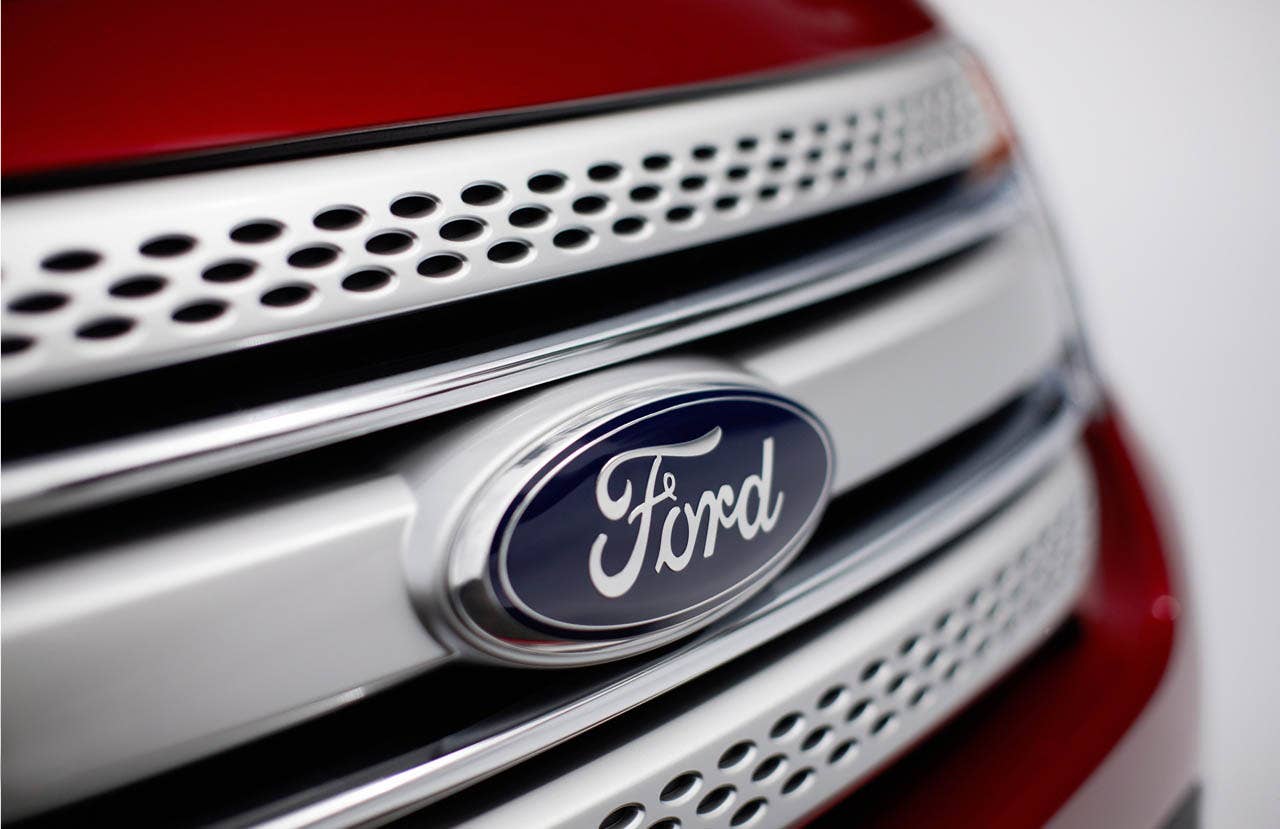 2011 Ford Explorer: Holes in the top and bottom rungs of the signature Ford three bar grille signify Explorer weight savings and efficiency. (07/26/2010)