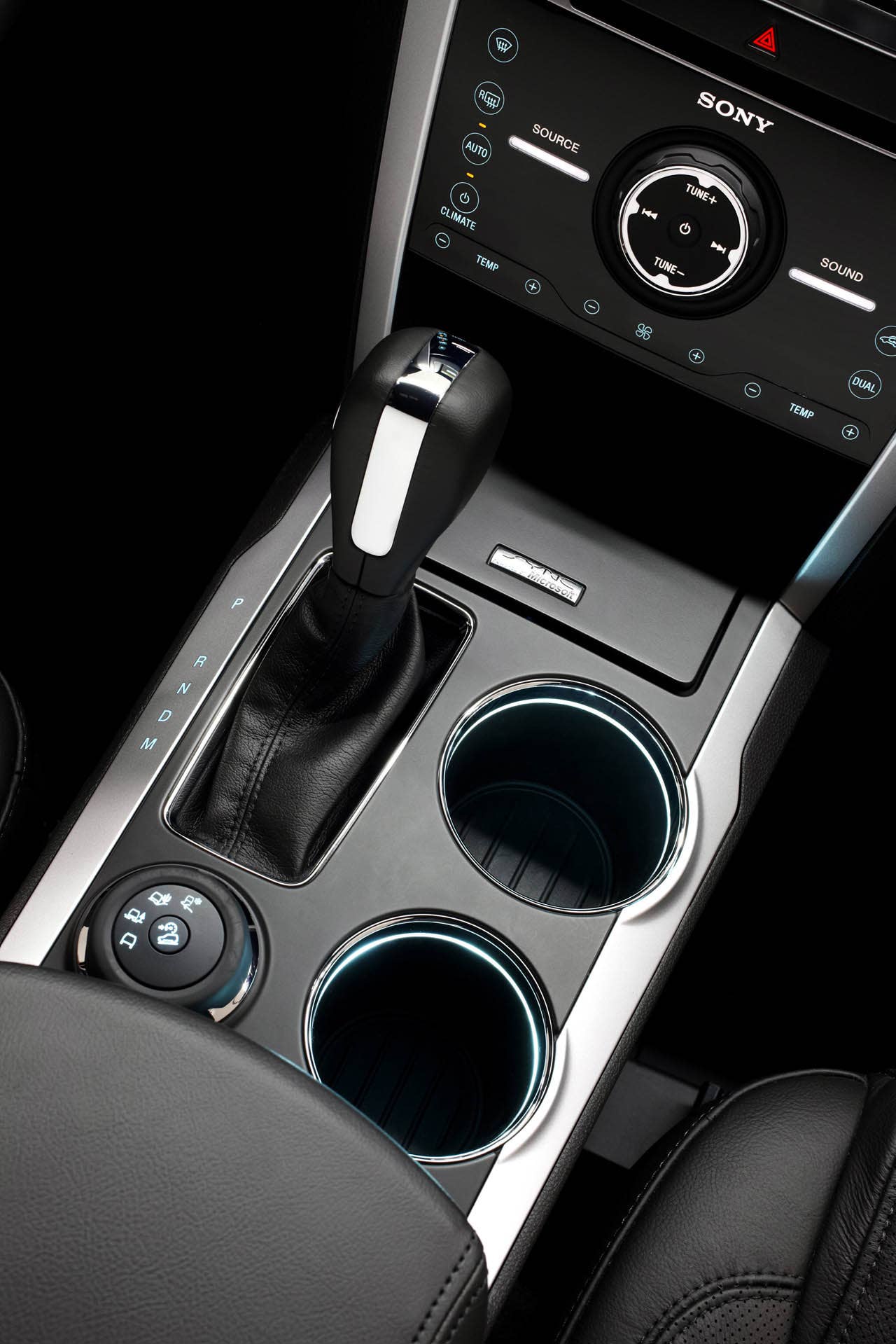 2011 Ford Explorer: Explorer's center console features dual cupholders. (07/26/2010)