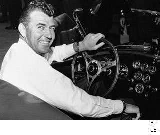Perhaps it was the effeminate name that gave Carroll Shelby the onus to overcompensate, but he was a man whose life verily defined masculinity. A champion race car driver in an era in which there were few more daring endeavors, an automotive genius whose creativity birthed what are today some of the most collectible cars extant, an entrepreneur whose very name became a powerful brand—Shelby lived all of those lives. He died on May 10 in Dallas, at 89 years of age. A Texan both by birth and in spirit, Shelby’s outsized fame began when he turned from chicken farming to racing in the 1950’s. As a talented wheelman-for-hire, he drove all manner of cars for wealthy owners during the decade, from sports cars to open-wheel Formula One race cars. Shelby even raced on the Bonneville Salt Flats, setting speed records in an Austin-Healey. Shelby landed a spot on the Aston Martin factory team and a seat in its DBR1 in the 24 Hours of Le Mans in 1959, where he achieved his greatest fame as a driver, winning the race with co-pilot Roy Salvadori. Pictured: Carroll Shelby and the CSX2000, the first Shelby Cobra.