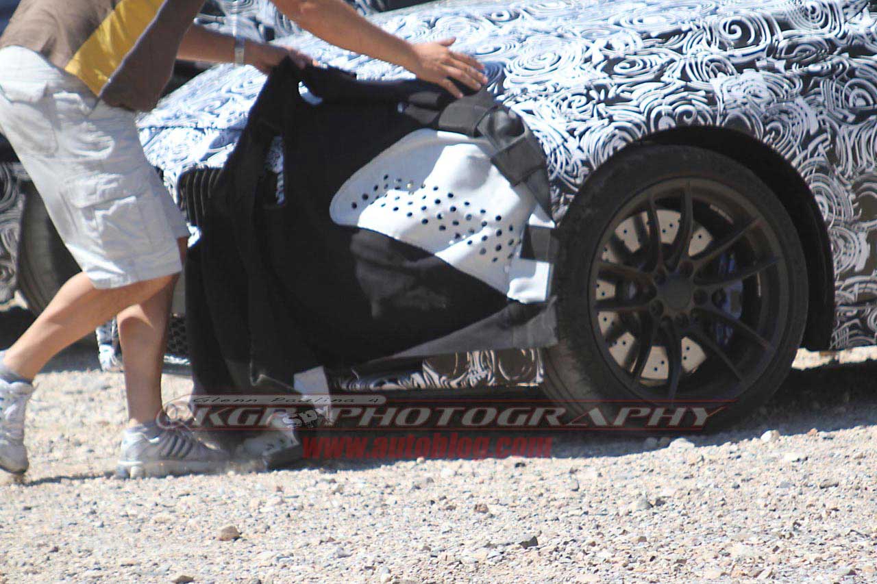 BMW M3 Spy Shots removing camo