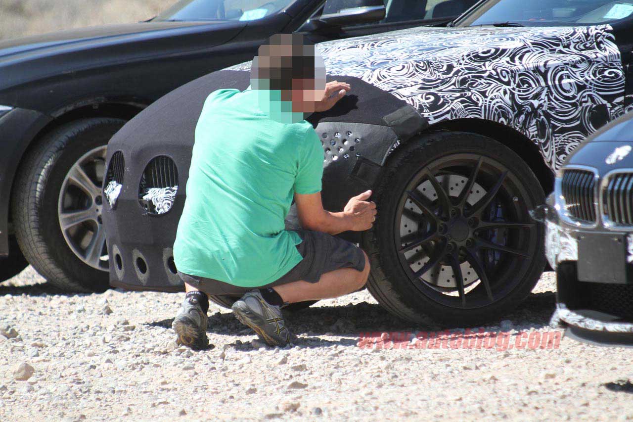 BMW M3 Spy Shots removing camo