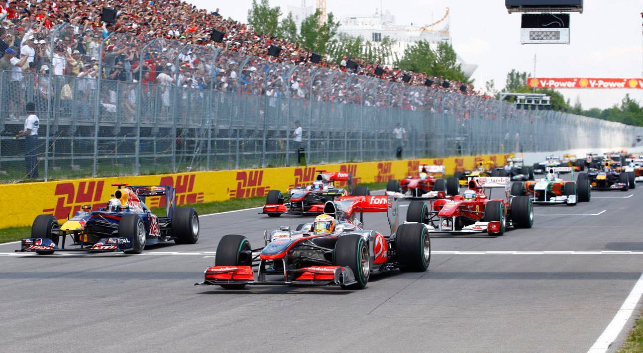 McLaren driver Lewis Hamilton, of England, leads the pack just after the start of the Canadian Grand Prix auto race Sunday, June 13, 2010, in Montreal. Hamilton won the race. (AP Photo/The Canadian Press, Paul Chiasson)