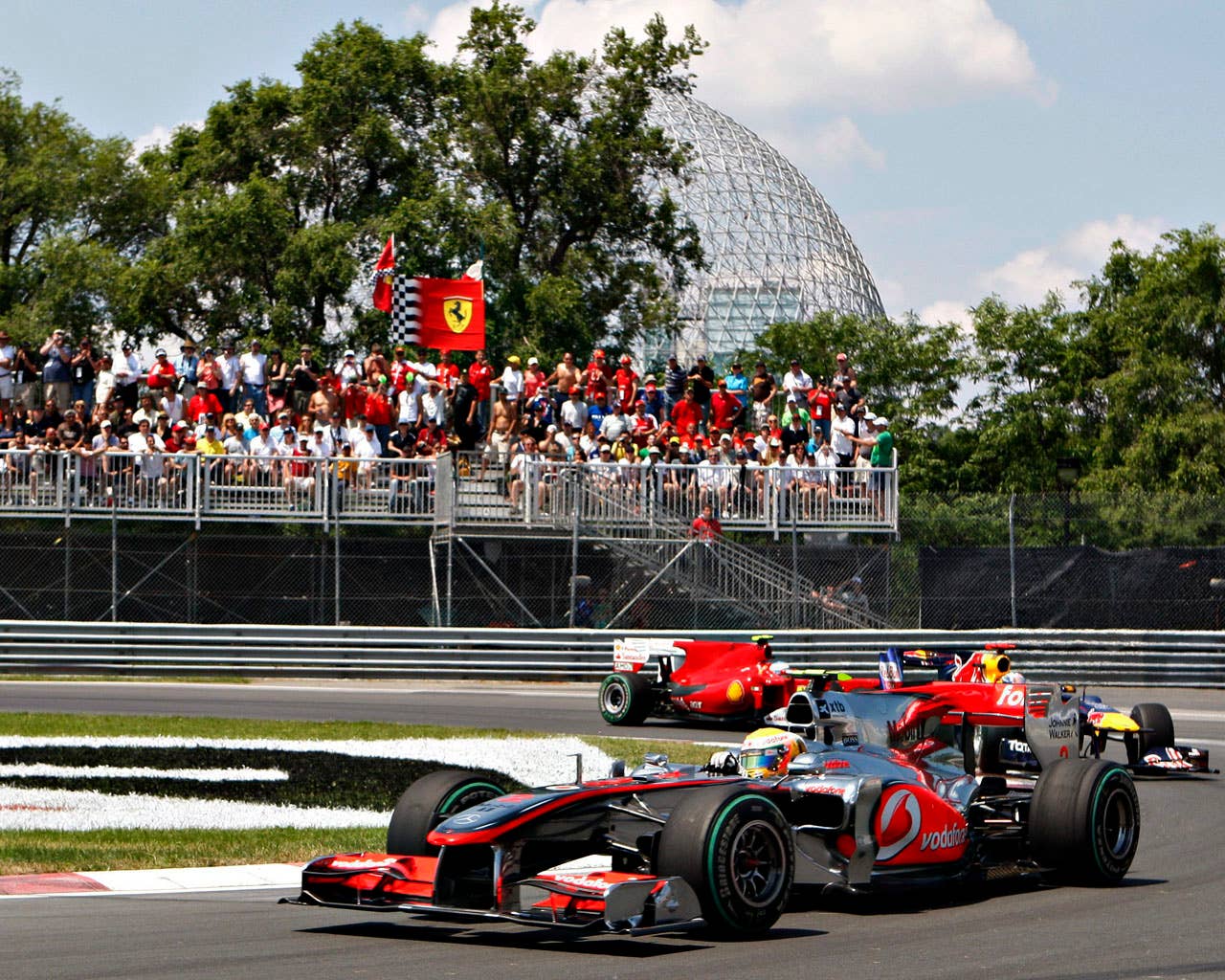 McLaren Mercedes driver Lewis Hamilton of Britain races to victory  Sunday June 13, 2010 at the Formula One Canadian Grand Prix in Montreal. Red Bull driver Mark Webber of Australia and Ferrari driver Fernando Alonso of Spain are behind.(AP Photo/The Canadian Press,Jacques Boissinot)