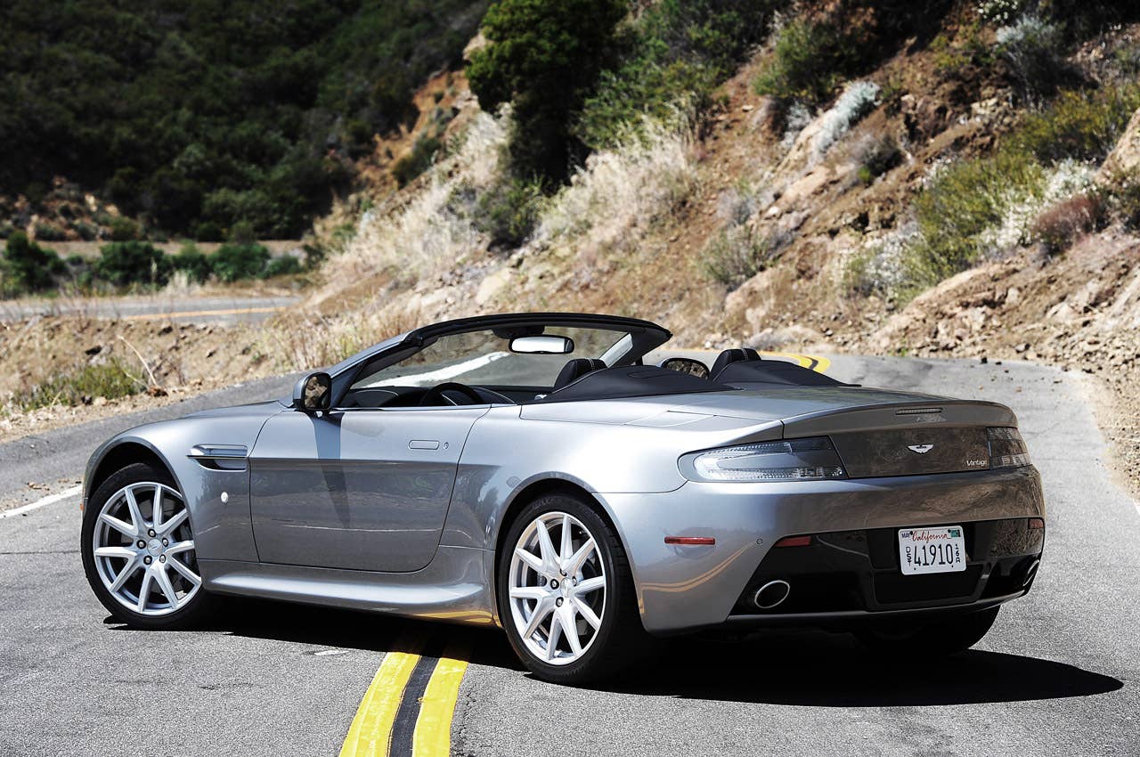 2013 Aston Martin V8 Vantage Roadster rear 3/4 view
