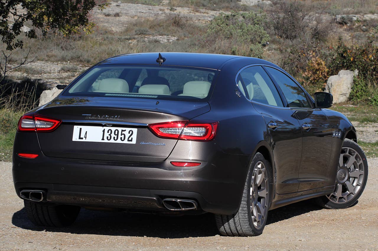 2014 Maserati Quattroporte rear 3/4 view