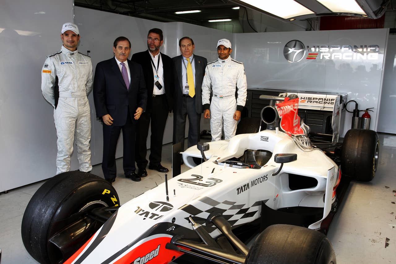 (L to R): Vitantonio Liuzzi (ITA) Hispania Racing F1 Team (HRT), Jose Ramon Carabante (ESP) Hispania Racing F1 Team (HRT) Team Owner, Carlos Gracia (ESP) President, Real Federacion Espanola de Automovilismo and Narain Karthikeyan (IND) Hispania Racing F1 Team (HRT) with the new HRT F111. Formula One Testing, Day 4, Barcelona, Spain, Friday 11 March 2011.