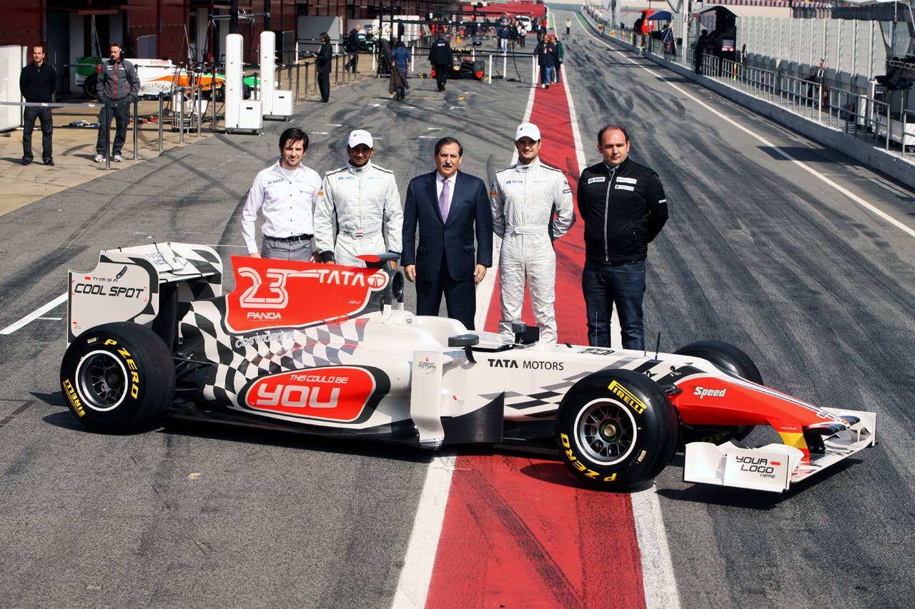 (L to R): Jose Carabante Aguilera (ESP) Groupo Hispania, Narain Karthikeyan (IND) Hispania Racing F1 Team (HRT), Jose Ramon Carabante (ESP) Hispania Racing F1 Team (HRT) Team Owner, vlp and Colin Kolles (GER) Hispania Racing F1 Team (HRT) Team Principal. Formula One Testing, Day 4, Barcelona, Spain, Friday 11 March 2011.