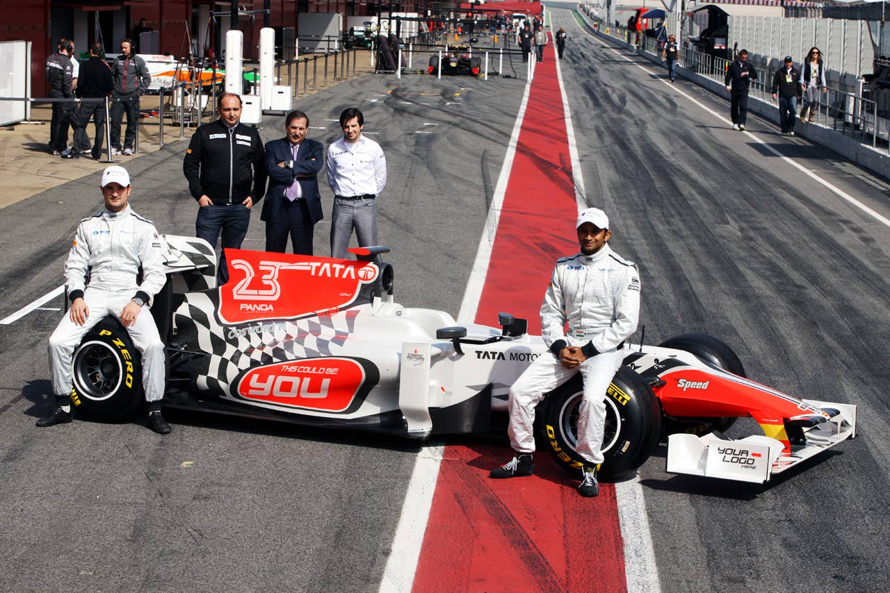 (L to R): Vitantonio Liuzzi (ITA) Hispania Racing F1 Team (HRT), Colin Kolles (GER) Hispania Racing F1 Team (HRT) Team Principal, Jose Ramon Carabante (ESP) Hispania Racing F1 Team (HRT) Team Owner, Jose Carabante Aguilera (ESP) Groupo Hispania and Narain Karthikeyan (IND) Hispania Racing F1 Team (HRT). Formula One Testing, Day 4, Barcelona, Spain, Friday 11 March 2011.