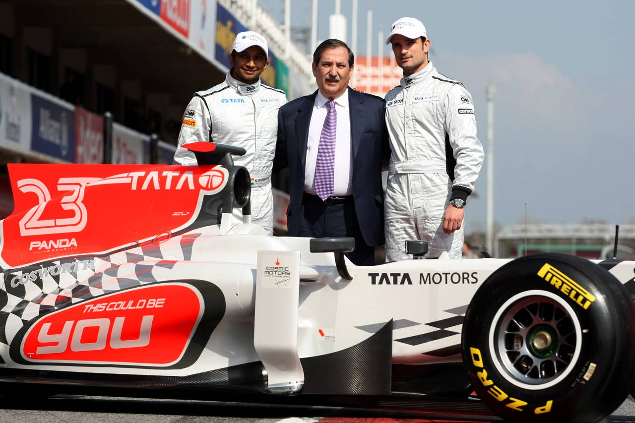 (L to R): Narain Karthikeyan (IND) Hispania Racing F1 Team (HRT), Jose Ramon Carabante (ESP) Hispania Racing F1 Team (HRT) Team Owner, and Vitantonio Liuzzi (ITA) Hispania Racing F1 Team (HRT) with the new HRT F111. Formula One Testing, Day 4, Barcelona, Spain, Friday 11 March 2011.