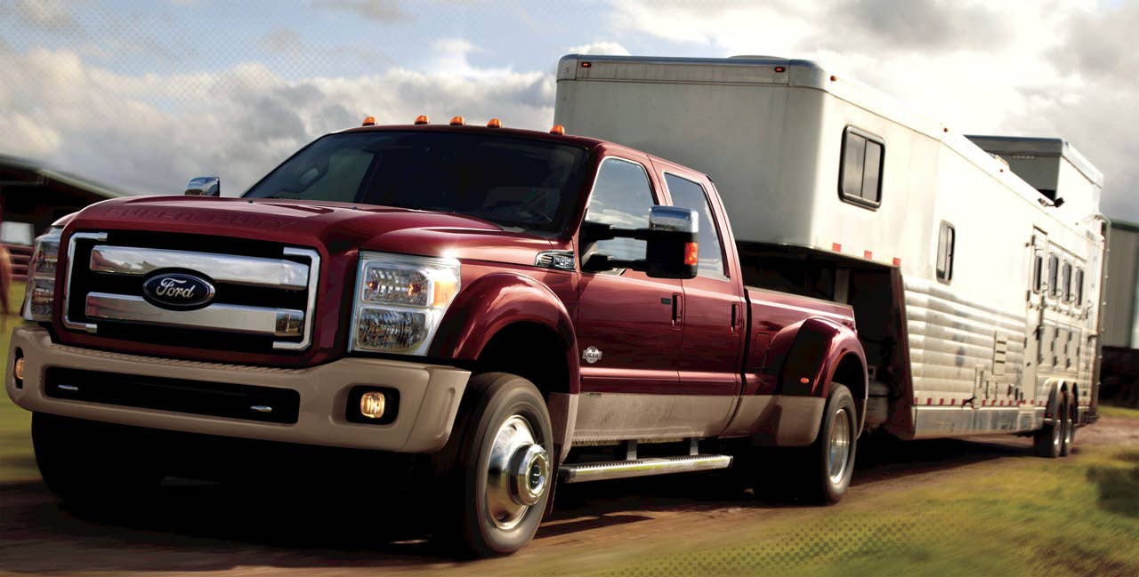 2011 Ford F-450 Super Duty: The 2011 Ford F-Series F-450 Super Duty King Ranch(R) crew cab 4x4 in Royal Red with Chrome Package and available equipment. (2/25/2010)