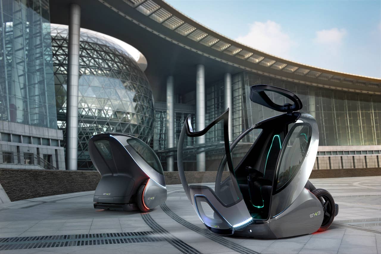 EN-V, which is short for Electric Networked-Vehicle, maintains the core principle of personal mobility - freedom - while helping remove the motor vehicle from the environmental debate and redefining design leadership. EN-V is a two-seat electric vehicle that was designed to alleviate concerns surrounding traffic congestion, parking availability, air quality and affordability for tomorrow's cities. The Maio (Magic) model (pictured) was unveiled today in Shanghai alongside Jiao (Pride) and Xiao (Laugh). They represent three different characteristics which emphasize that future transportation can be fun. X10CO_SV021 (03/24/2010)