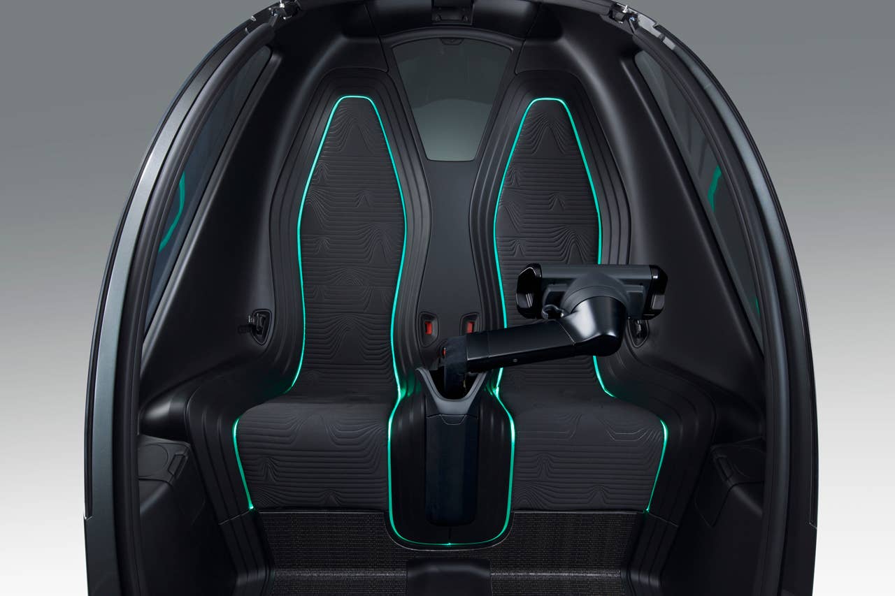 EN-V, which is short for Electric Networked-Vehicle, maintains the core principle of personal mobility - freedom - while helping remove the motor vehicle from the environmental debate and redefining design leadership. EN-V is a two-seat electric vehicle that was designed to alleviate concerns surrounding traffic congestion, parking availability, air quality and affordability for tomorrow's cities. The Maio (Magic) model (pictured) was unveiled today in Shanghai alongside Jiao (Pride) and Xiao (Laugh). They represent three different characteristics which emphasize that future transportation can be fun. X10CO_SV023 (03/24/2010)