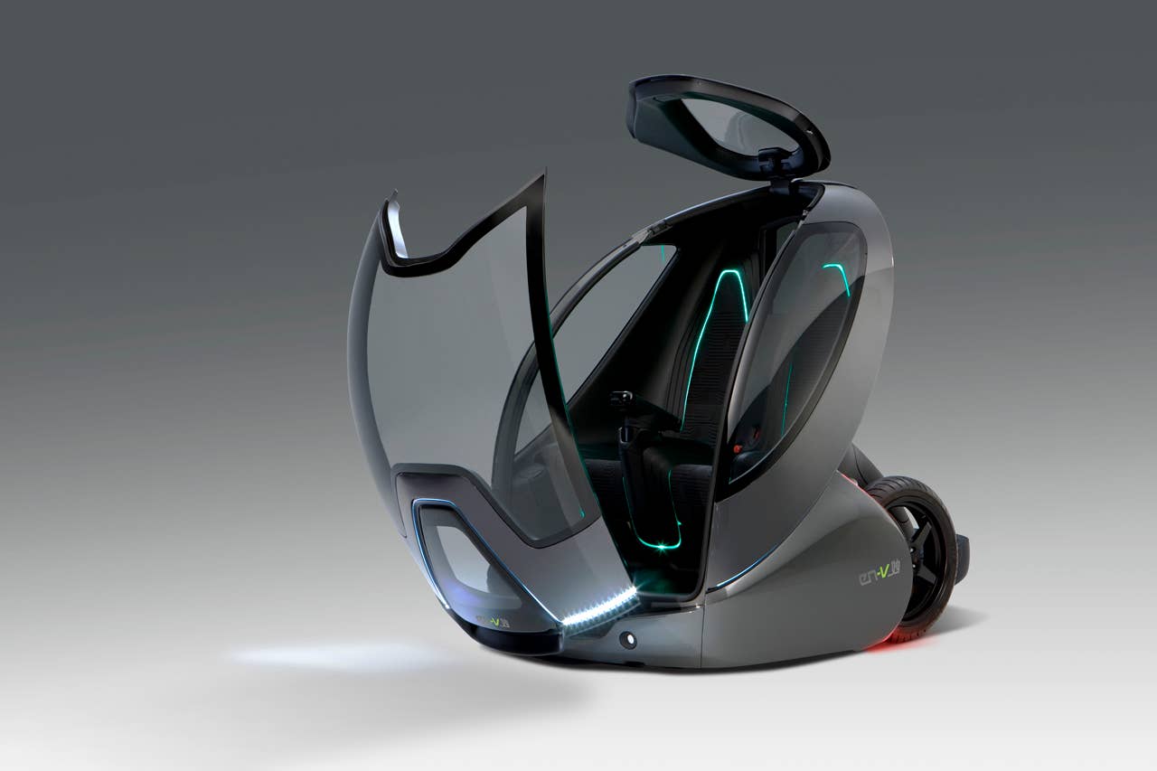 EN-V, which is short for Electric Networked-Vehicle, maintains the core principle of personal mobility - freedom - while helping remove the motor vehicle from the environmental debate and redefining design leadership. EN-V is a two-seat electric vehicle that was designed to alleviate concerns surrounding traffic congestion, parking availability, air quality and affordability for tomorrow's cities. The Maio (Magic) model (pictured) was unveiled today in Shanghai alongside Jiao (Pride) and Xiao (Laugh). They represent three different characteristics which emphasize that future transportation can be fun. X10CO_SV018 (03/24/2010)