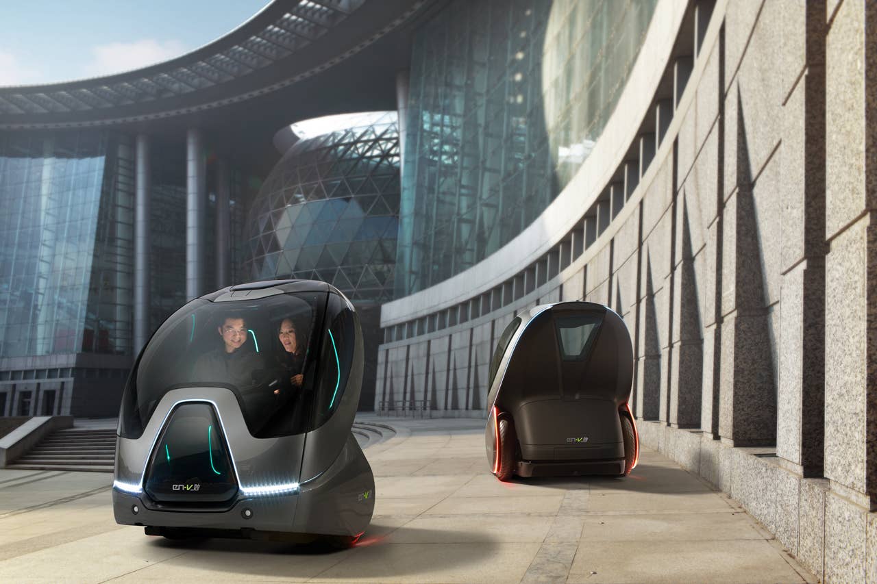 EN-V, which is short for Electric Networked-Vehicle, maintains the core principle of personal mobility - freedom - while helping remove the motor vehicle from the environmental debate and redefining design leadership. EN-V is a two-seat electric vehicle that was designed to alleviate concerns surrounding traffic congestion, parking availability, air quality and affordability for tomorrow's cities. The Maio (Magic) model (pictured) was unveiled today in Shanghai alongside Jiao (Pride) and Xiao (Laugh). They represent three different characteristics which emphasize that future transportation can be fun. X10CO_SV022 (03/24/2010)