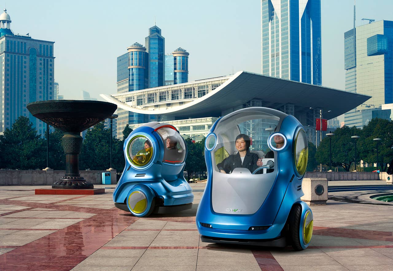 EN-V, which is short for Electric Networked-Vehicle, maintains the core principle of personal mobility - freedom - while helping remove the motor vehicle from the environmental debate and redefining design leadership.EN-V is a two-seat electric vehicle that was designed to alleviate concerns surrounding traffic congestion, parking availability, air quality and affordability for tomorrow's cities. The Xiao (Laugh) model (pictured) was unveiled today in Shanghai alongside Jiao (Pride) and Maio (Magic). They represent three different characteristics which emphasize that future transportation can be fun. X10CO_SV033 (03/24/2010)