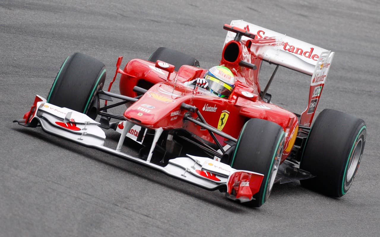 Ferrari Formula 1 driver Felipe Massa of Brazil steers his car to finish third the Qualifying at the race track in Hockenheim,  Germany, July 24, 2010. The race will take place on Sunday(AP Photo/Michael Probst)