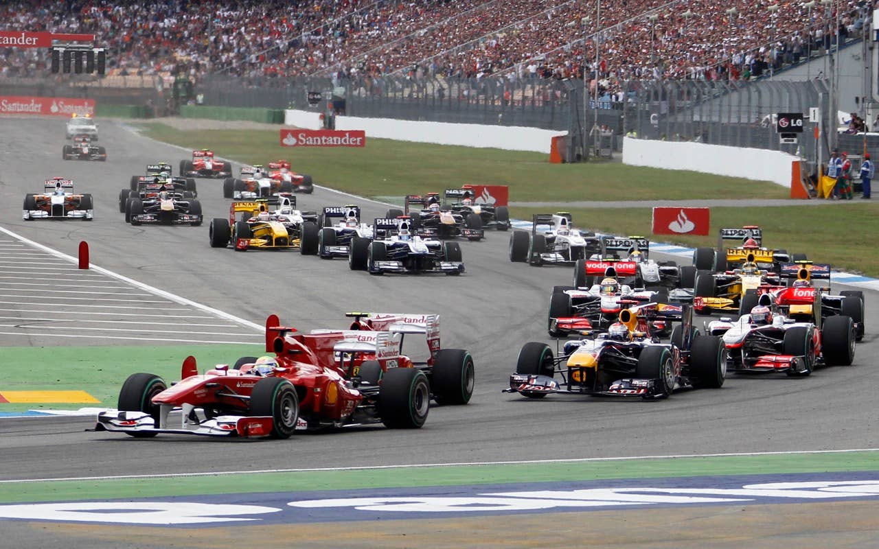 Ferrari driver Felipe Massa of Brazil  leads the pack at the start to the German Formula One Grand Prix in Hockenheim, Germany, Sunday, July 25, 2010. (AP Photo/Matthias Schrader)