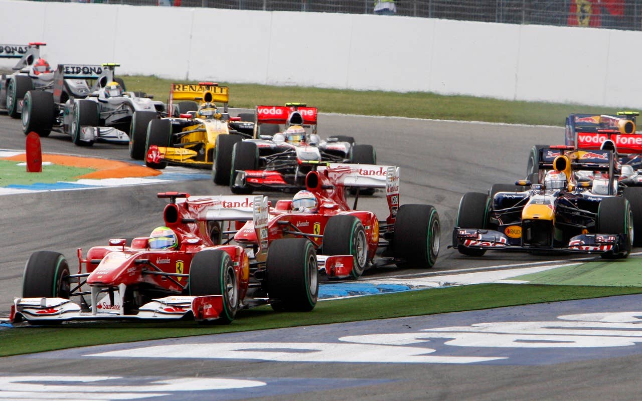 Ferrari Formula One driver Felipe Massa of Brazil leads the pack right after the start the race track in Hockenheim,  Germany, Sunday, July 25, 2010. (AP Photo/Michael Probst)