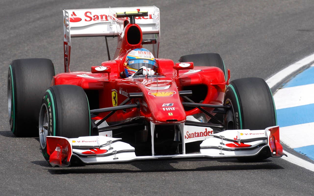 Ferrari  Formula One driver Fernando Alonso of Spain steers his car to finish second in the Qualifying at the race track in Hockenheim,  Germany, July 24, 2010. The race will take place on Sunday.(AP Photo/Michael Probst)