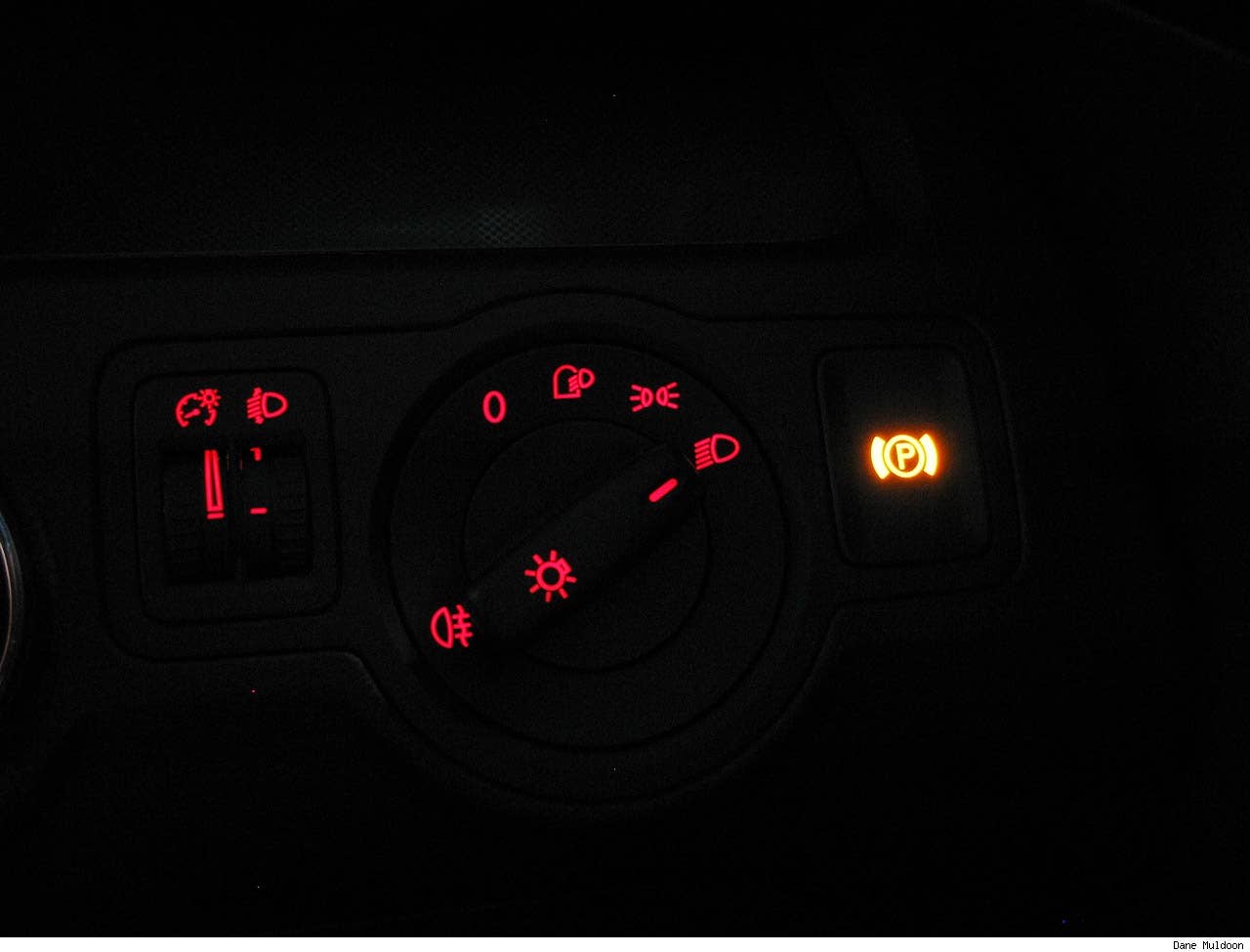 Park brake enabled via a push button