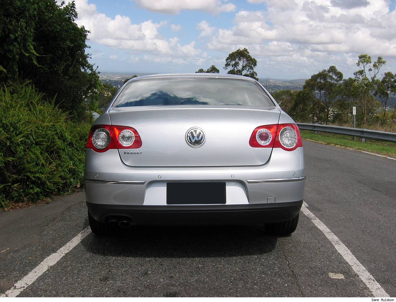 Note rear parking sensors, boot mounted lights are different (only one reversing light) and VW logo boot release