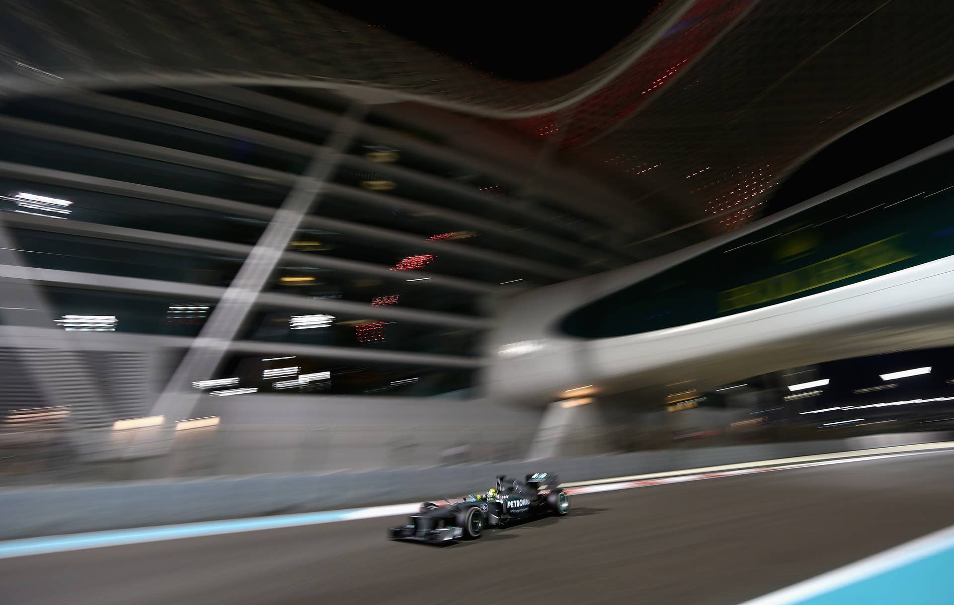 ABU DHABI, UNITED ARAB EMIRATES - NOVEMBER 03: Nico Rosberg of Germany and Mercedes GP drives during the Abu Dhabi Formula One Grand Prix at the Yas Marina Circuit on November 3, 2013 in Abu Dhabi, United Arab Emirates. (Photo by Clive Mason/Getty Images)